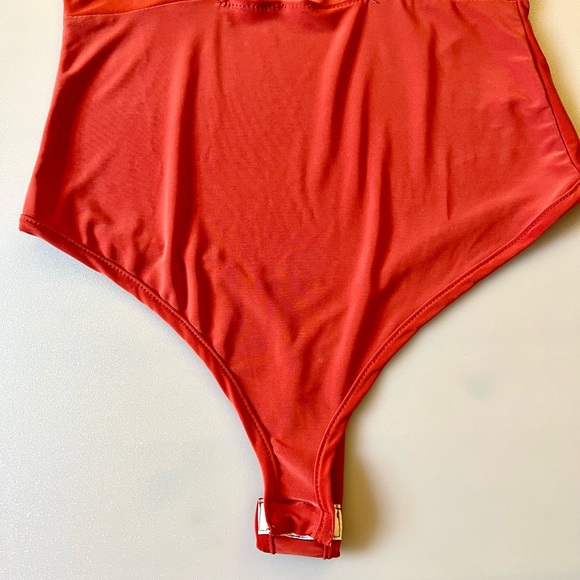 New, Mocking Jay Red Coral Stretchy Short Sleeves V-Neck Bodysuit. Size Small. - Picture 4 of 5